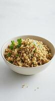 A delicious and healthy bowl of quinoa, a wholesome and nutritious meal option. photo