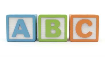 Three colorful blocks displaying the letters a, b, and c in a row, perfect for learning. photo