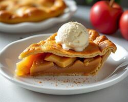 Delicious slice of apple pie with creamy vanilla ice cream topping photo
