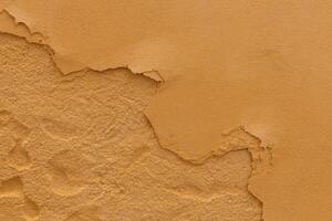 Peeling Plaster Wall with Rough Texture photo
