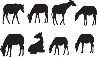 Silhouettes of various animals, including deer, antelope, and giraffe vector