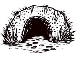 Natural cave entrance surrounded by grass and stones in a wilderness setting vector