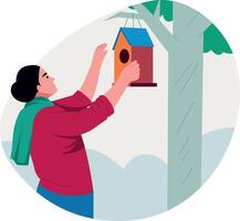 Flat illustration showing a character hanging birdhouse in the garden vector