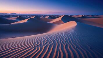 Sand Dunes Landscape at Dawn with Soft Colors and Wavy Patterns photo