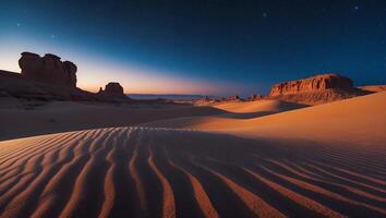 Desert Landscape with Sand Dunes and Rock Formations Under Starry Sky photo