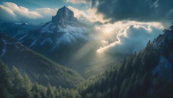 Mountain Peak Among Clouds and Forest with Sun Rays photo