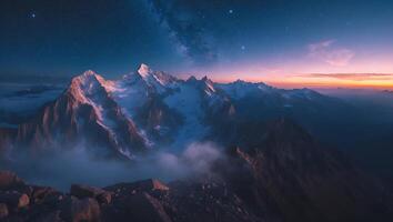 Snowy Mountain Range at Dusk with Milky Way Backdrop photo