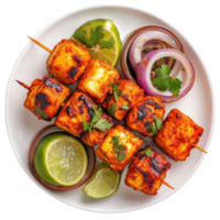Paneer tikka on a plate on transparent background. png