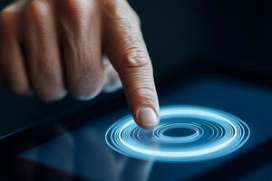 Finger activating digital holographic interface on modern tablet photo