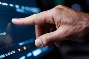 Software engineer working with big data on interactive touchscreen display photo
