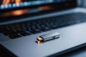 Usb c dongle resting on modern laptop keyboard, embracing technological connectivity photo