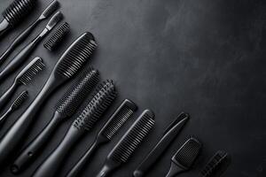 Professional hairdressing tools lying on dark background creating stylish composition photo