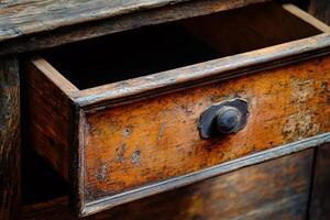 Rustic wooden drawer with vintage handle design photo