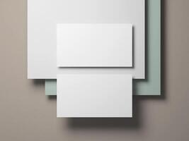Stylish business card mockup with three layered backgrounds of white, gray, and pastel green. photo