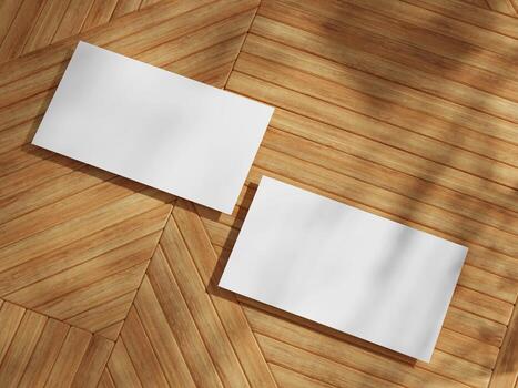 Clean and simple business card mockup placed on a wooden floor with geometric lines, suitable for any branding project. photo