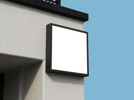 Modern building logo sign mockup with a clear square frame, showcasing space for logo insertion. photo