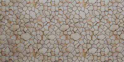 A stone wall with a pattern of rocks photo