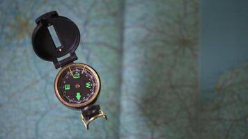 Top view photography of compass with maps in background photo
