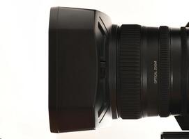 Extreme macro photography of camcorder camera lens - side view photo
