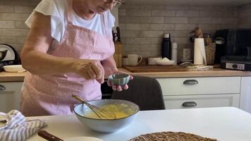Pastry chef whisking ingredients in bowl video