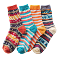 A group of four colorful winter socks with different patterns, including stripes and snowflakes png