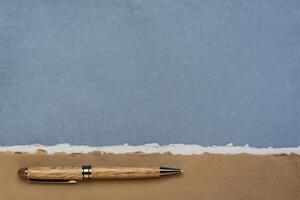 paper abstract with a copy space and pen photo
