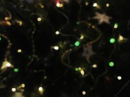 Enchanting bokeh of warm and cool lights, perfect for holiday or festive designs. Use as a background, overlay, or texture to add a magical touch to your projects. photo