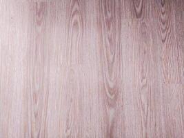 Stylish wooden floor texture. Natural wood grain pattern, perfect as a backdrop or surface. Use for interior design, construction, architectural projects. photo