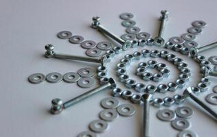 Flower Patterned Fasteners And Fixing Items Isolated On White Background photo