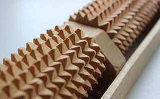 Wooden mechanism with identical gears mounted on an axle photo