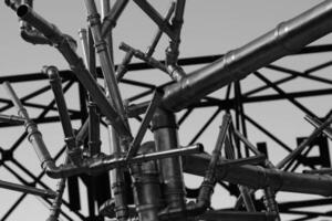 Cast Iron Tubes Welded Under Different Angles In Disordered Pattern. Piping And Tubing Connection Concept Stock Photo