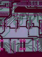 Pattern Of Colored PCB With Symbols And Numbers Closeup View photo