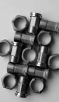 Water Plumbing Items. Water Meter Iron Fittings With Plumbing Nuts Laid Out Fitted Each Other Detailed View photo