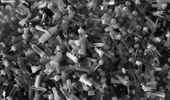 Safety Utilization Of Disposable Intravenous Drips And Transfusion Sets Black And White Image. Dangerous Medical Equipment Recycling Stock Photo