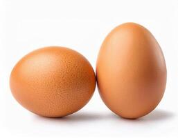 Two Brown Chicken Eggs Isolated on White Background Perfect for Cooking Recipes and Dietary Needs photo