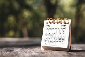 Calendar page May of the year 2026 on a natural background, with copy space and business design. Concept of monthly planning, important schedules, meetings, and appointments. photo