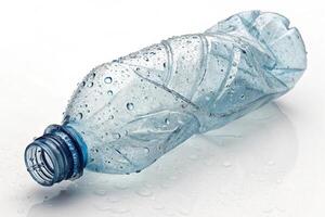 Empty Trash Bottle Isolated on White Background, Ecology Theme photo