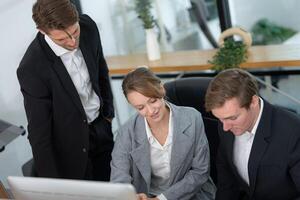 Team collaboration in a modern office setting during a work session focusing on a project discussion photo