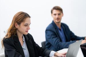 Professional setting with focused collaboration in a modern office during working hours photo