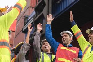 Group of engineer and worker team in industry containers yard, Success teamwork concepts photo