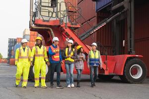 Happy business people engineer and worker team in industry containers yard, Success teamwork concepts photo