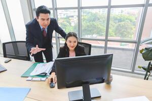 Professional business meeting in office environment, Asian businesspeople meeting in modern office, Teamwork and brainstorming concepts photo