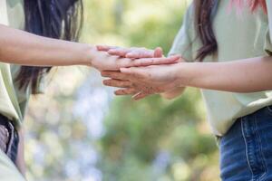 Group of volunteer people teamwork with join hand together, Unity and teamwork concepts photo