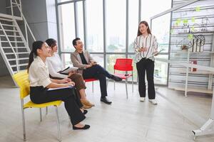 Teamwork and Brainstorming Concepts with Businesspeople in Office Meeting, Creative Business Meeting with Team Discussing Ideas in Office Space photo