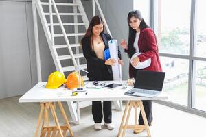 Group of Female engineer and architecture working together at project site, Team meeting and brainstorming concepts photo