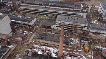 Old industrial zone with ruined buildings. Empty abandoned factory with brick edifices in place. Large aged enterprise. Top view. video