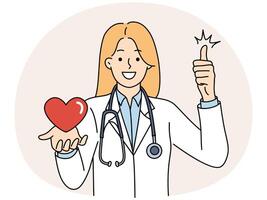 Woman doctor from in hospital with heart in hand smiling and showing thumb up vector