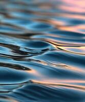 Calm water surface reflecting evening lights photo