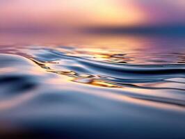 Rippling water reflects colorful sunset hues photo