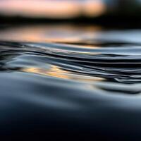 Reflections on calm water at sunset photo